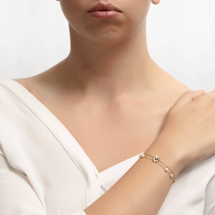 Δίχρωμο χρυσό βραχιόλι 14Κ με μαργαριτάρι