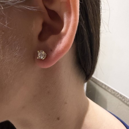 Χρυσά σκουλαρίκια Κ14 με κεντρική πέτρα ζιργκόν και πλάγια μικρά ζιργκόν