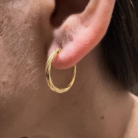 14K gold hoop earrings with engraved texture