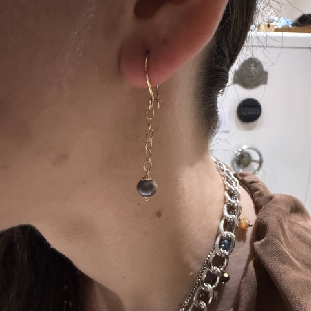 14K gold dangling earrings featuring a fine chain and a dark round bead