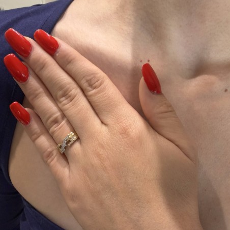 Δίχρωμο δαχτυλίδι Κ14 με πέτρες ζιργκόν.