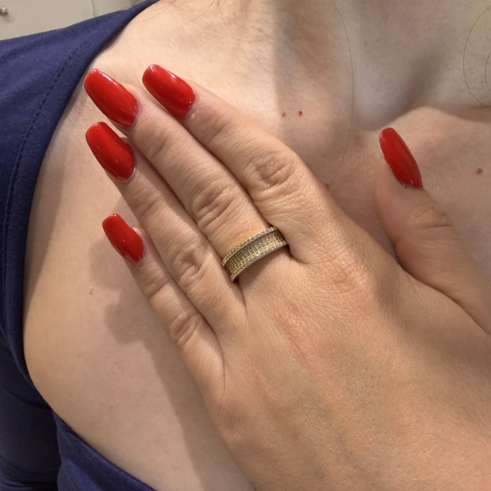 14K gold ring with multiple zircon stones in a wide band design