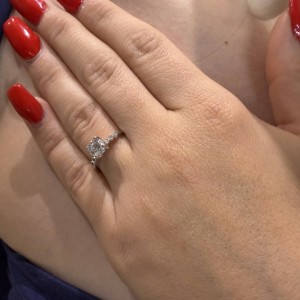 14K white gold ring with central zircon and side stones