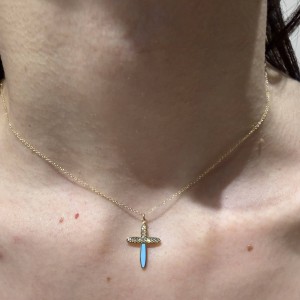 14K gold cross necklace with zircon stones.