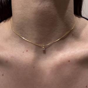 14K gold necklace with single zircon stone pendant.
