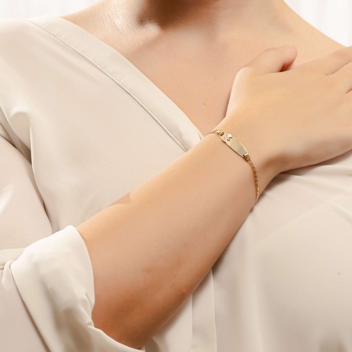 14K gold baby ID bracelet with child-shaped motif