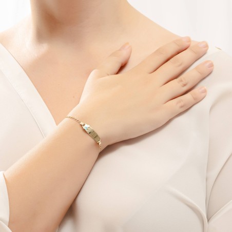 14K gold baby ID bracelet with child-shaped motif and blue enamel