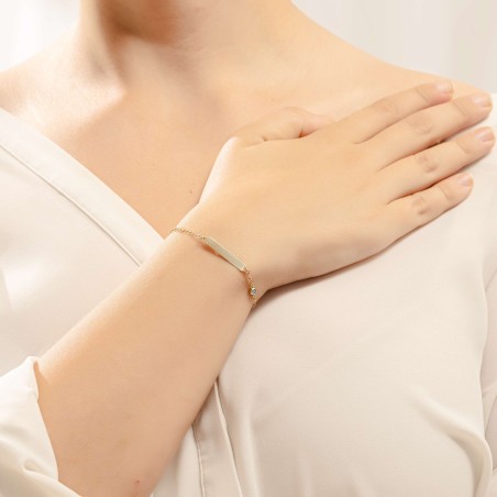 14K gold ID bracelet with blue stone detail