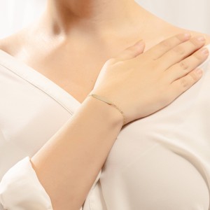 14K gold ID bracelet with engraving plate