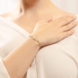 14K gold ID bracelet with evil eye charm