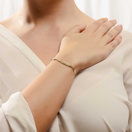 14K gold two-tone ID bracelet with cross motif and evil eye charm