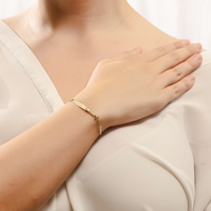 14K two-tone ID bracelet with cross