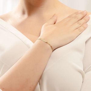 14K gold ID bracelet with heart motif