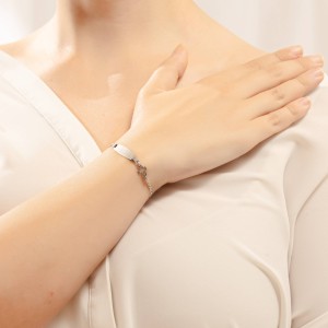 14K white gold ID bracelet with cross motif