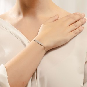 14K white gold ID bracelet with engraved star details