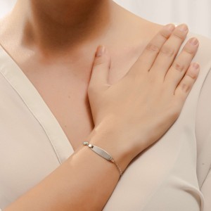 14K white gold ID bracelet with evil eye charm