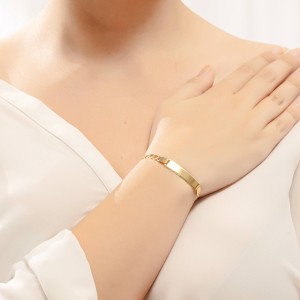 14K gold ID bracelet with engraving plate