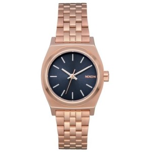 Nixon watch with rose gold bracelet and dark dial