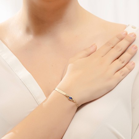 14K gold ID bracelet with blue stone