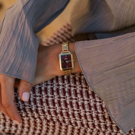 JCou watch with burgundy dial and gold metal bracelet