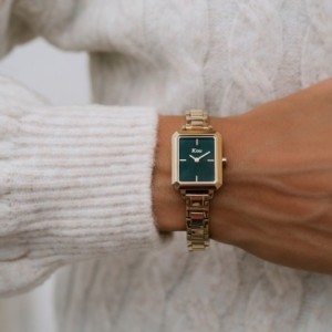 JCou watch with green dial and gold metal bracelet