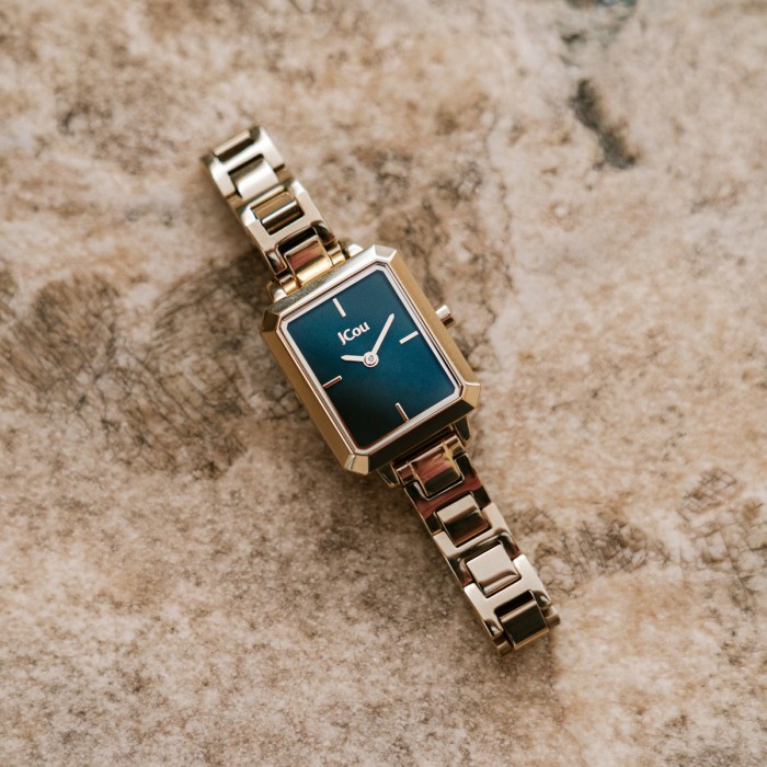 JCou watch with green dial and gold metal bracelet