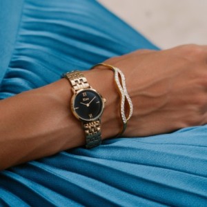 JCou watch with black dial and gold metal bracelet