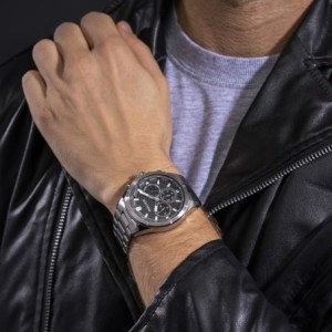 Police watch with silver bracelet and green dial