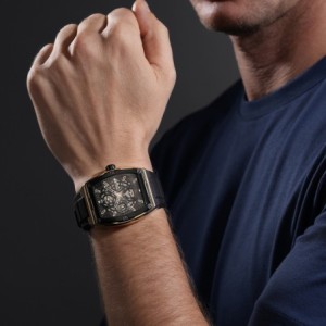 Police watch with black rubber strap, gold-tone case and black dial