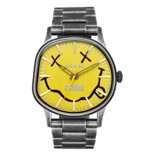 Nixon Nirvana watch with yellow dial and metal bracelet